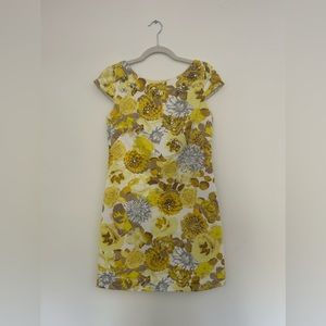 Yellow, floral dress with cap sleeves and rhinestone embellishment